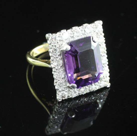 An 18ct gold and platinum, amethyst and diamond tablet ring, size H.
